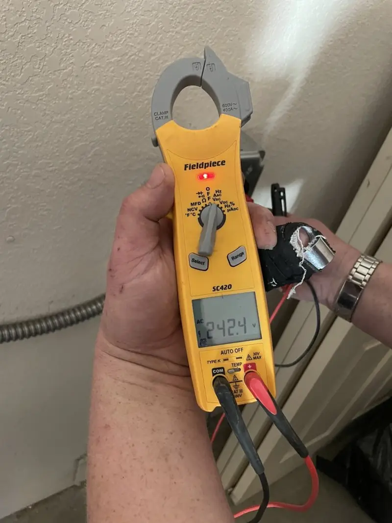 Voltage testing with clamp meter during Generator Installation in Columbia
